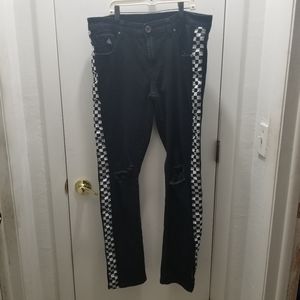 BLK DNM Collection. Black Distressed ripped Jean's Checkerboard on the s…